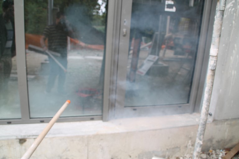 Perméabilité à l'air par injection de fumée.